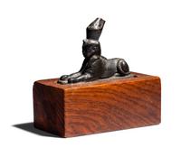 An Egyptian Bronze Sphinx