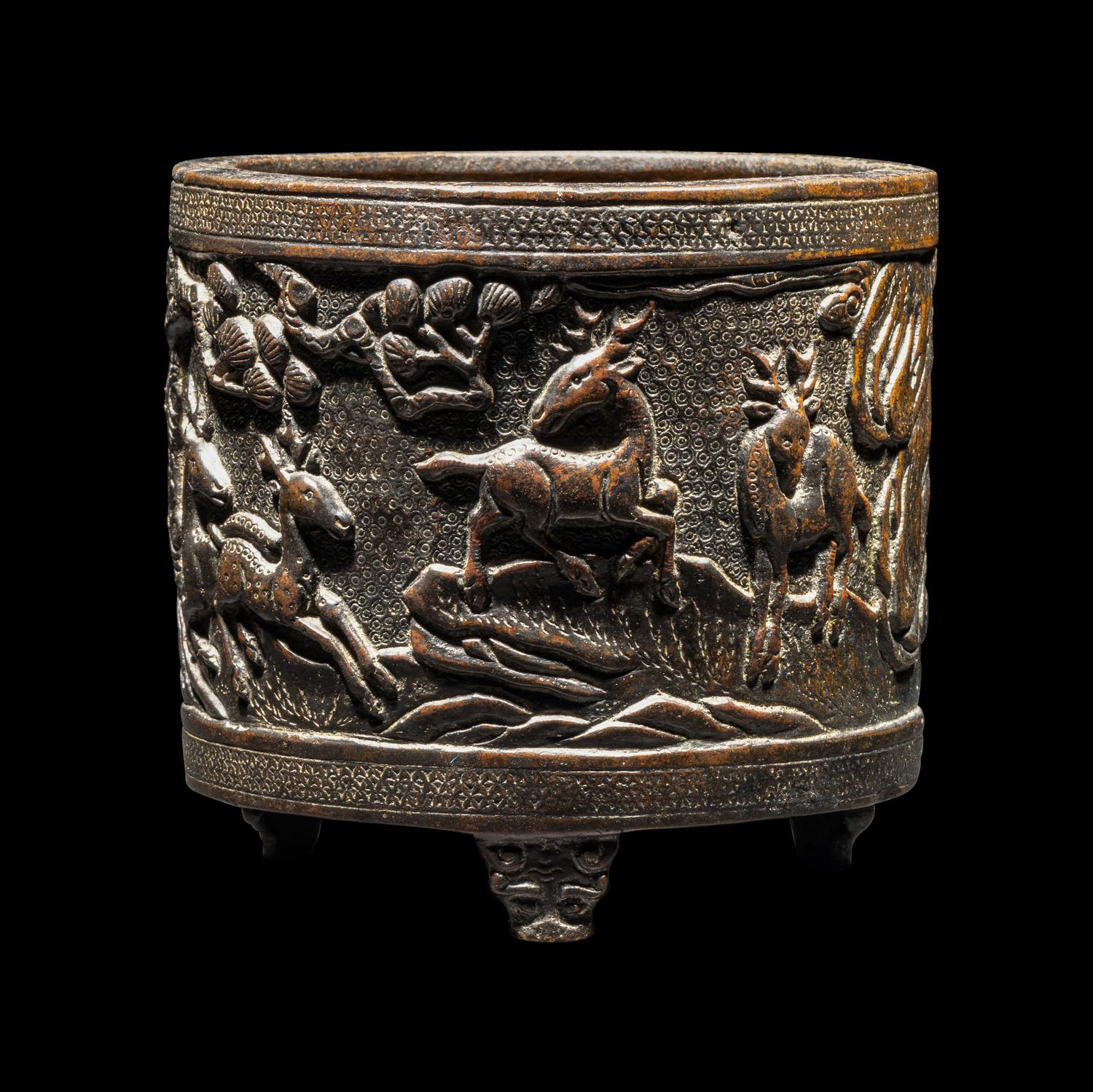 A Chinese Bronze 'Pine and Deer' Incense Burner 銅松鹿圖三足爐
