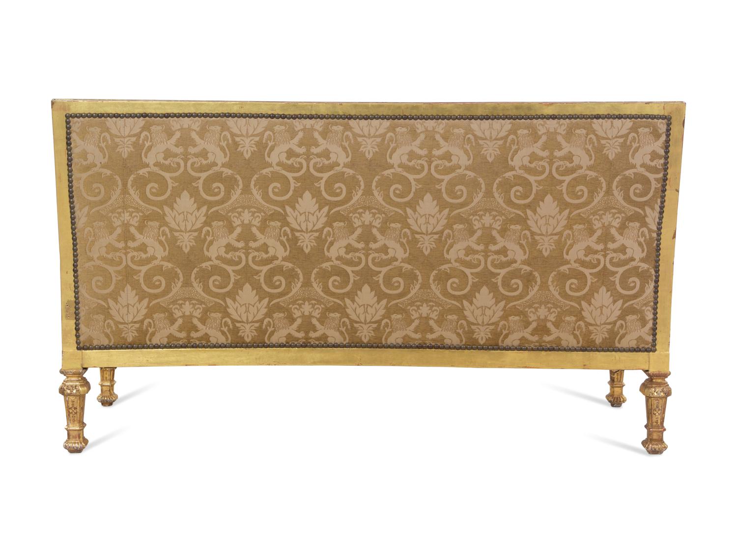 A Pair of Régence Style Carved Giltwood Sofas