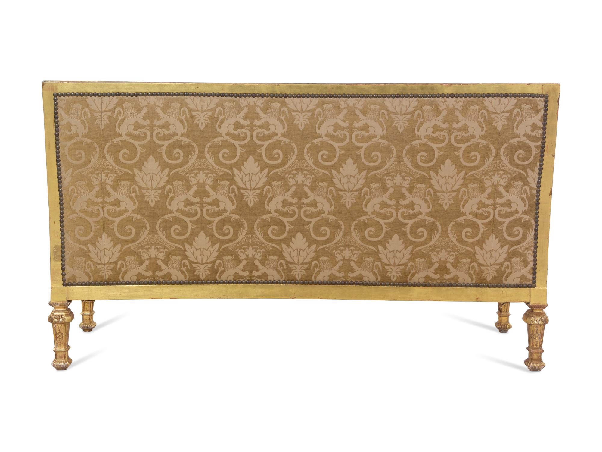 A Pair of Régence Style Carved Giltwood Sofas