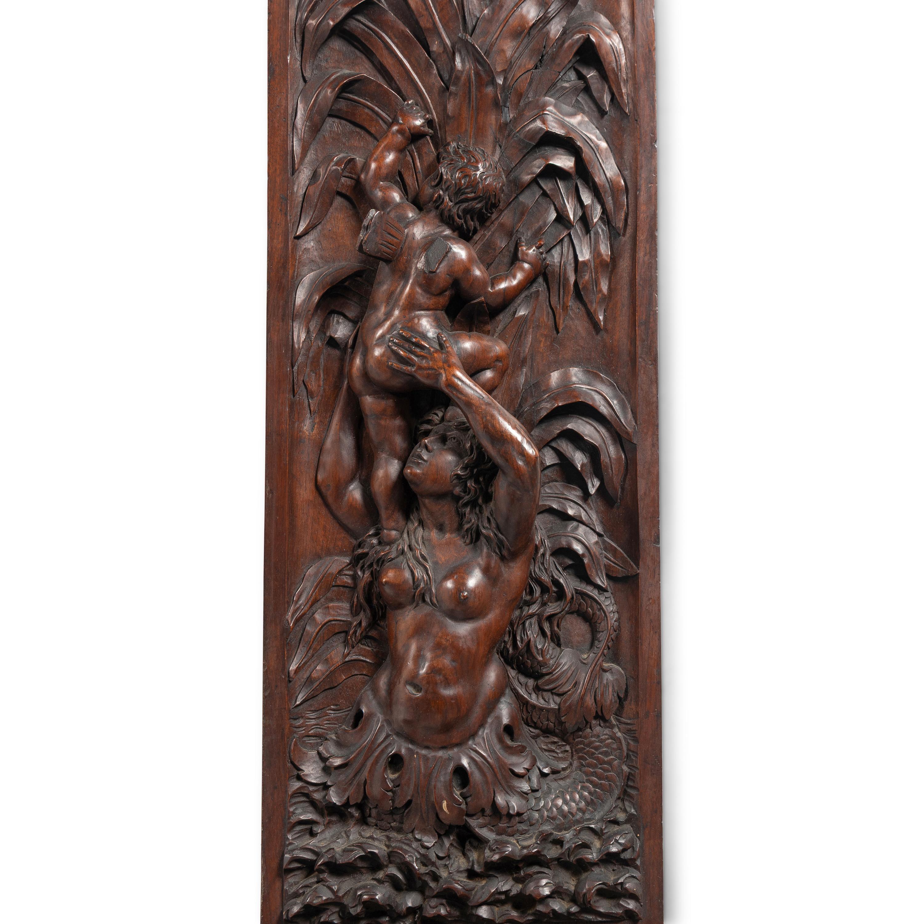 An Italian Carved Walnut Mantelpiece