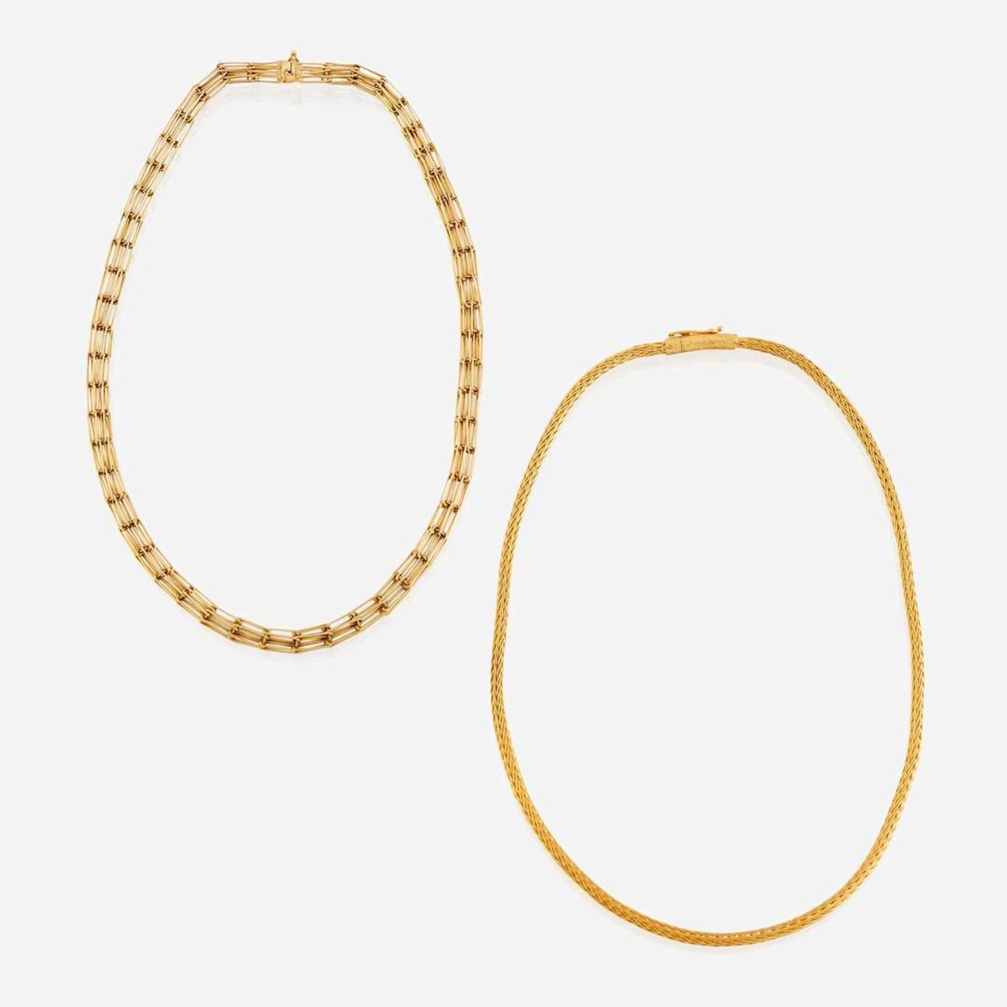 Two eighteen karat gold chains