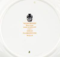 A Wedgwood Gold Florentine Porcelain Dinner Service