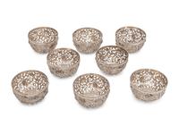 A Set of Eight Chinese Export Pierced Silver Bowl Liners