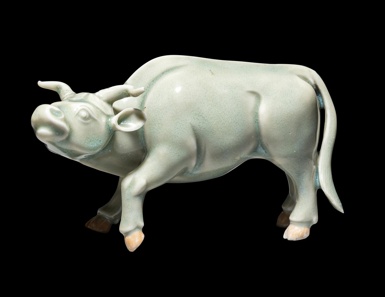 A Japanese Hirado Celadon Glazed Porcelain Water Buffalo-Form Water Dropper