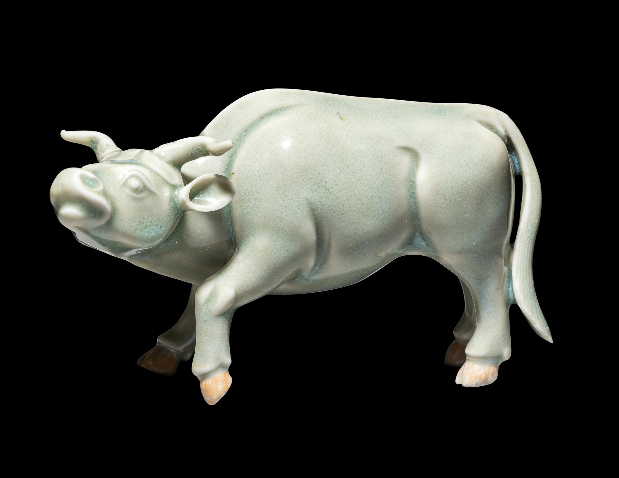 A Japanese Hirado Celadon Glazed Porcelain Water Buffalo-Form Water Dropper