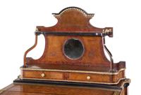 A Napoleon III Style Gilt Bronze Mounted Burlwood and Parcel Ebonized Étagère Table