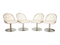 A Russell Woodard Dining Table with Four Chairs
