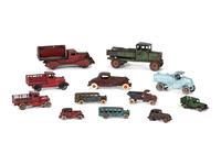 Twelve Painted Cast Iron Cars, Buses, and Trucks