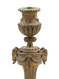 A French Gilt Bronze Candlestick and Figural Mirror