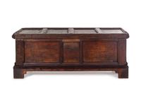 A German Carved and Paneled Walnut Kast