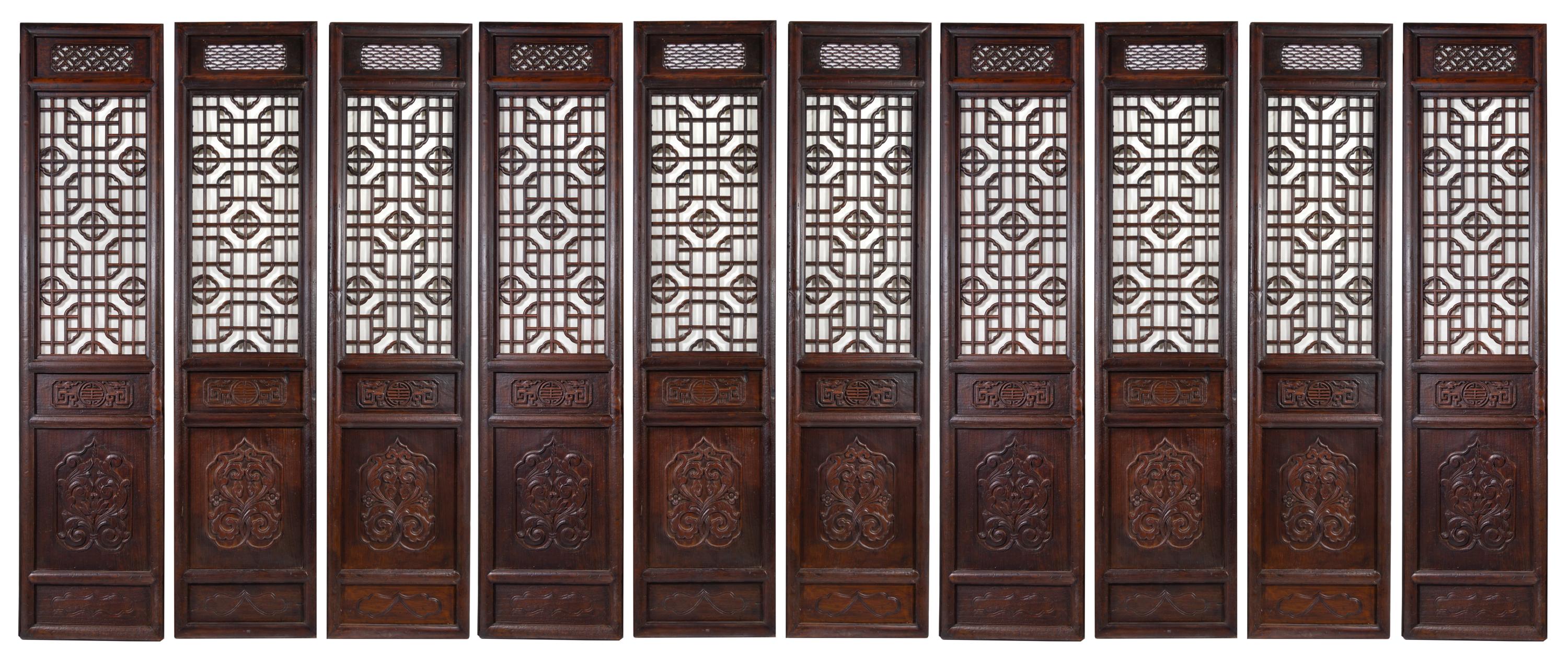 A Large Chinese Zitan Ten-Panel Floor Screen Height 109 x width 25 1/4 x depth 2 1/2 inches. — QING DYNASTY (1644-1911)