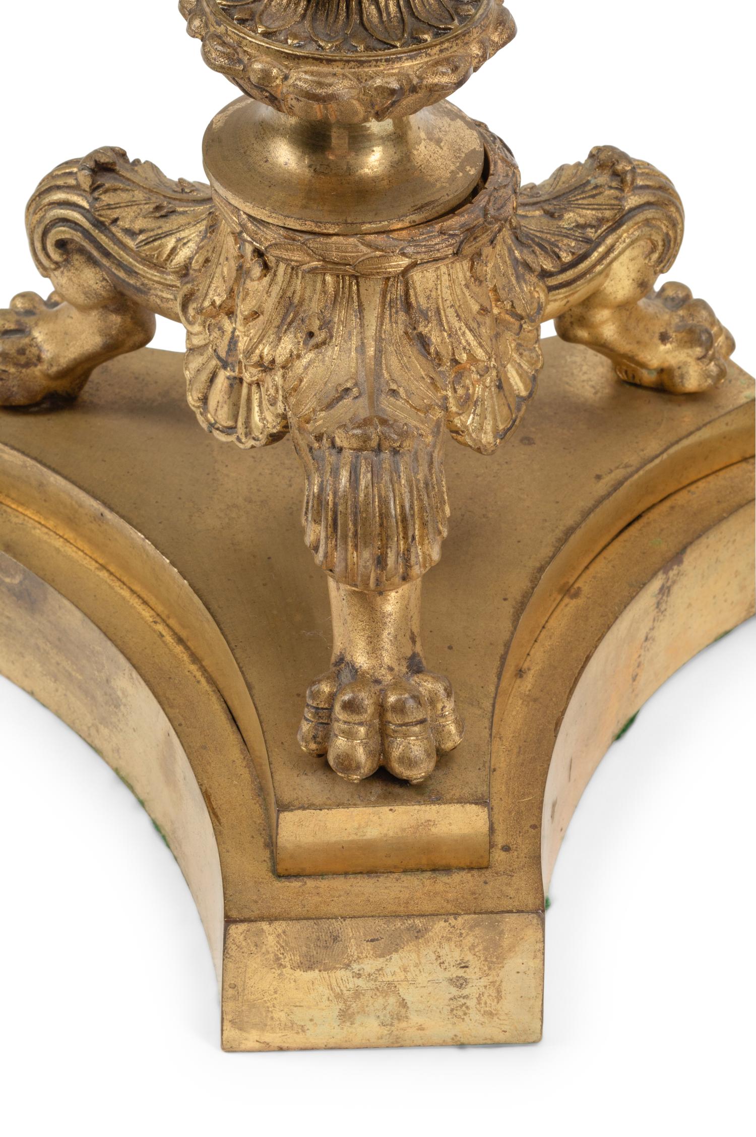 A Pair of French Gilt Bronze Candlesticks