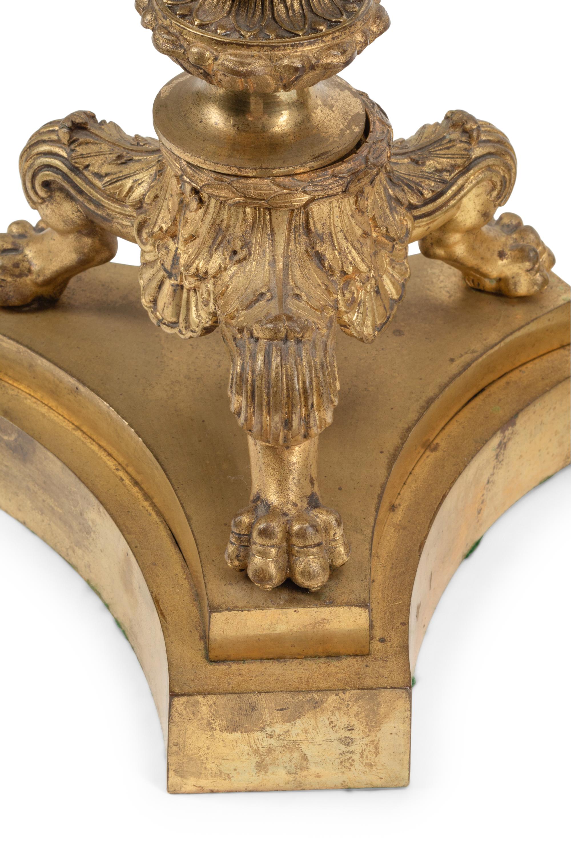 A Pair of French Gilt Bronze Candlesticks