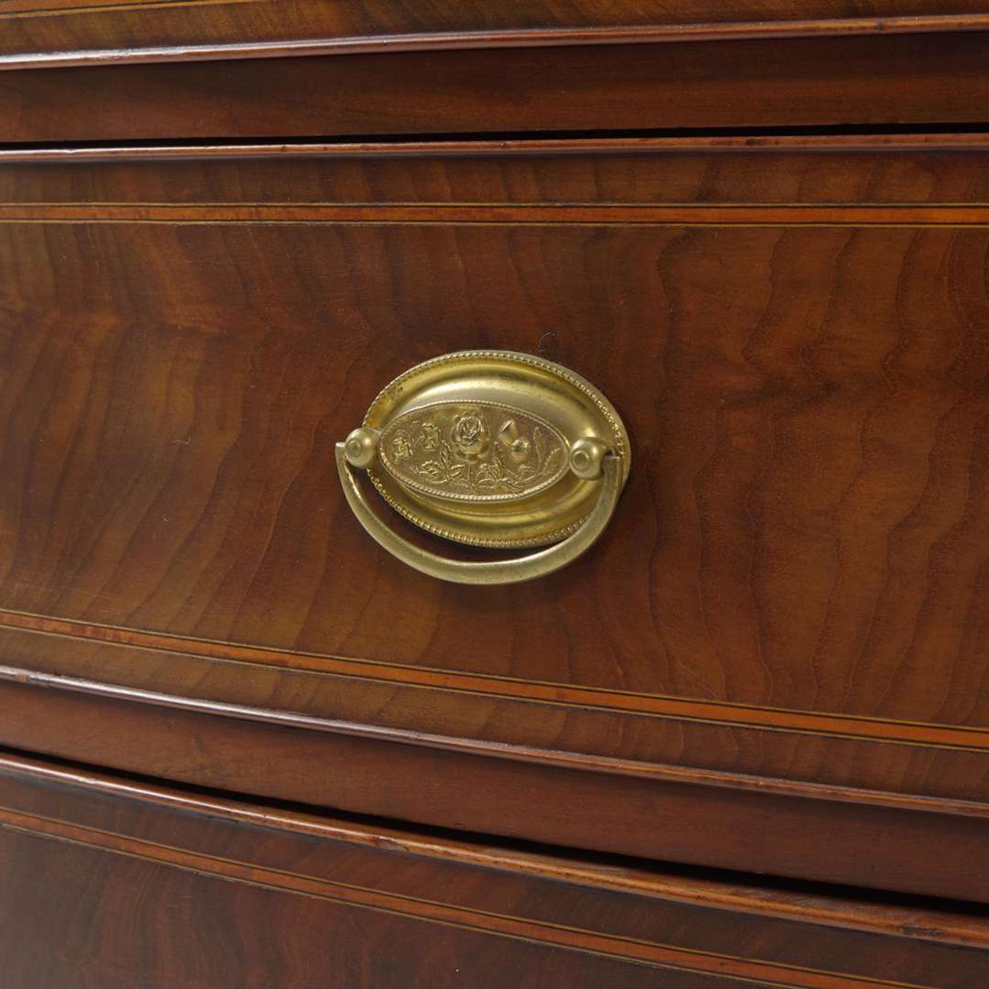 A Federal bowfront inlaid mahogany chest of drawers circa 1800