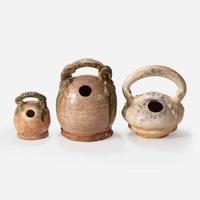 Three assorted Vietnamese lime pots 15th - 19th century