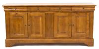 A French Provincial Carved Elm Sideboard Height 40 1/2 x width 86 1/2 x depth 21 1/2 inches. — 19TH CENTURY