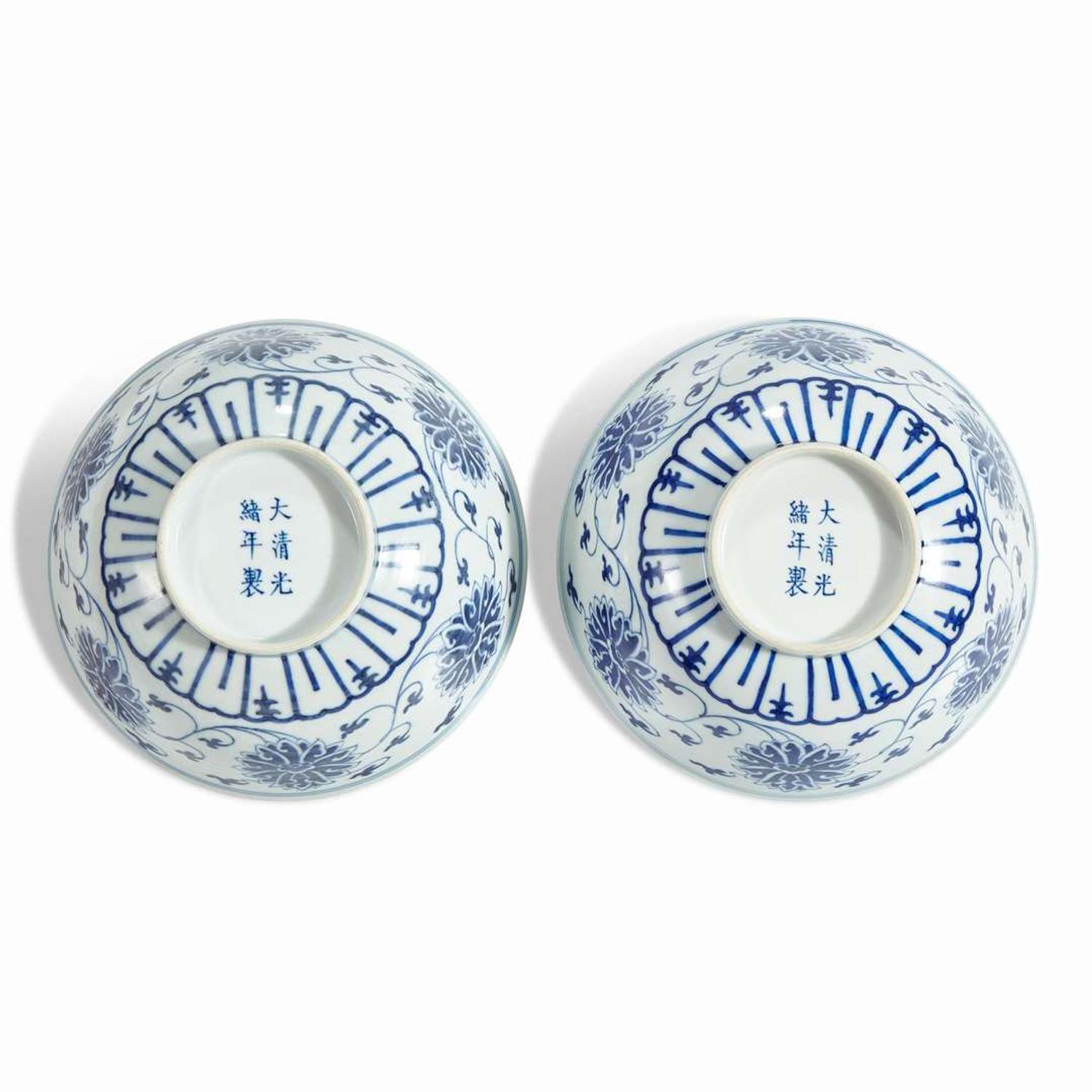 An associated pair of Chinese blue and white porcelain "Lotus" bowls Guangxu six-character marks