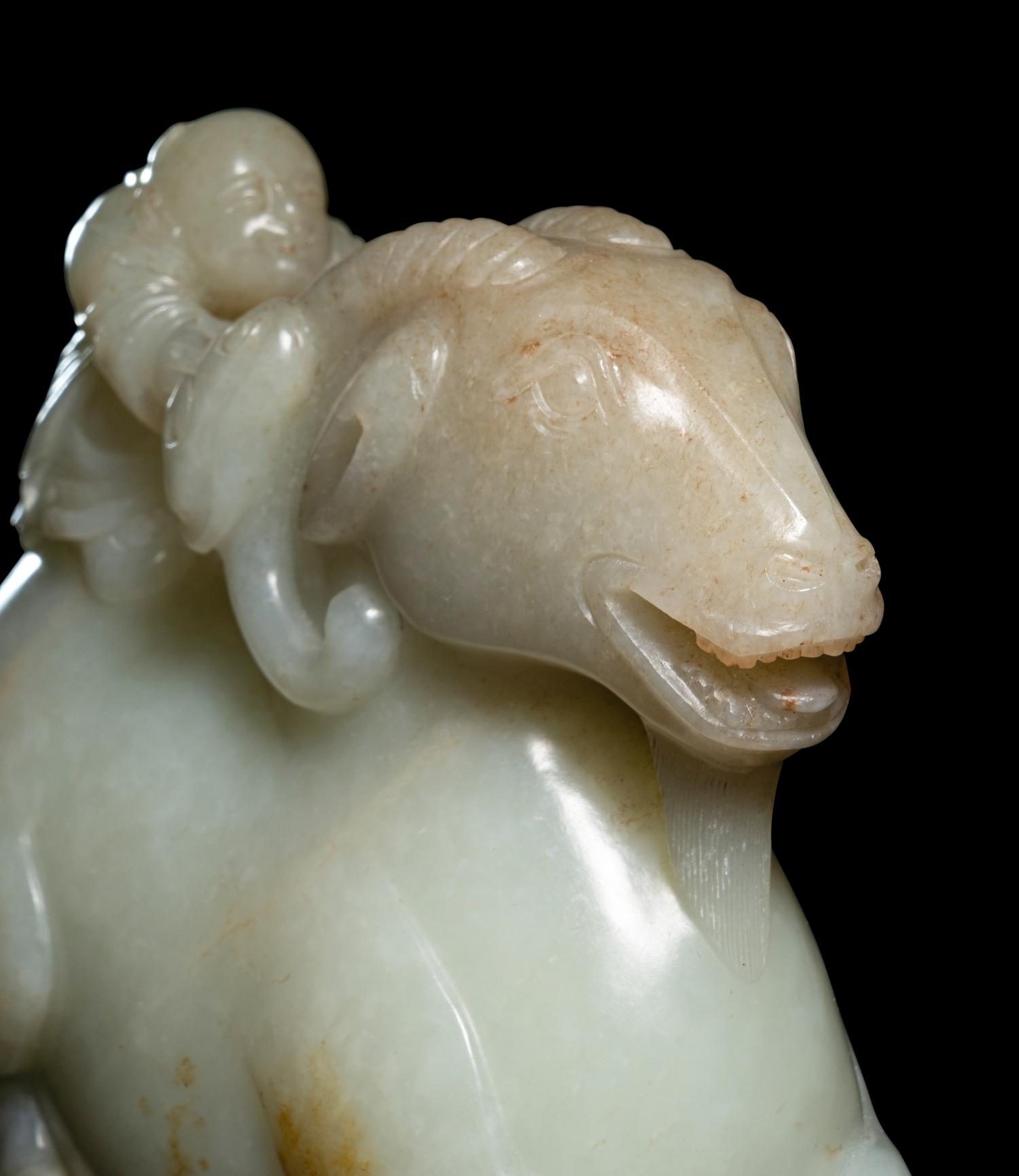 A Pale Celadon Jade 'Ram and Boy' Group