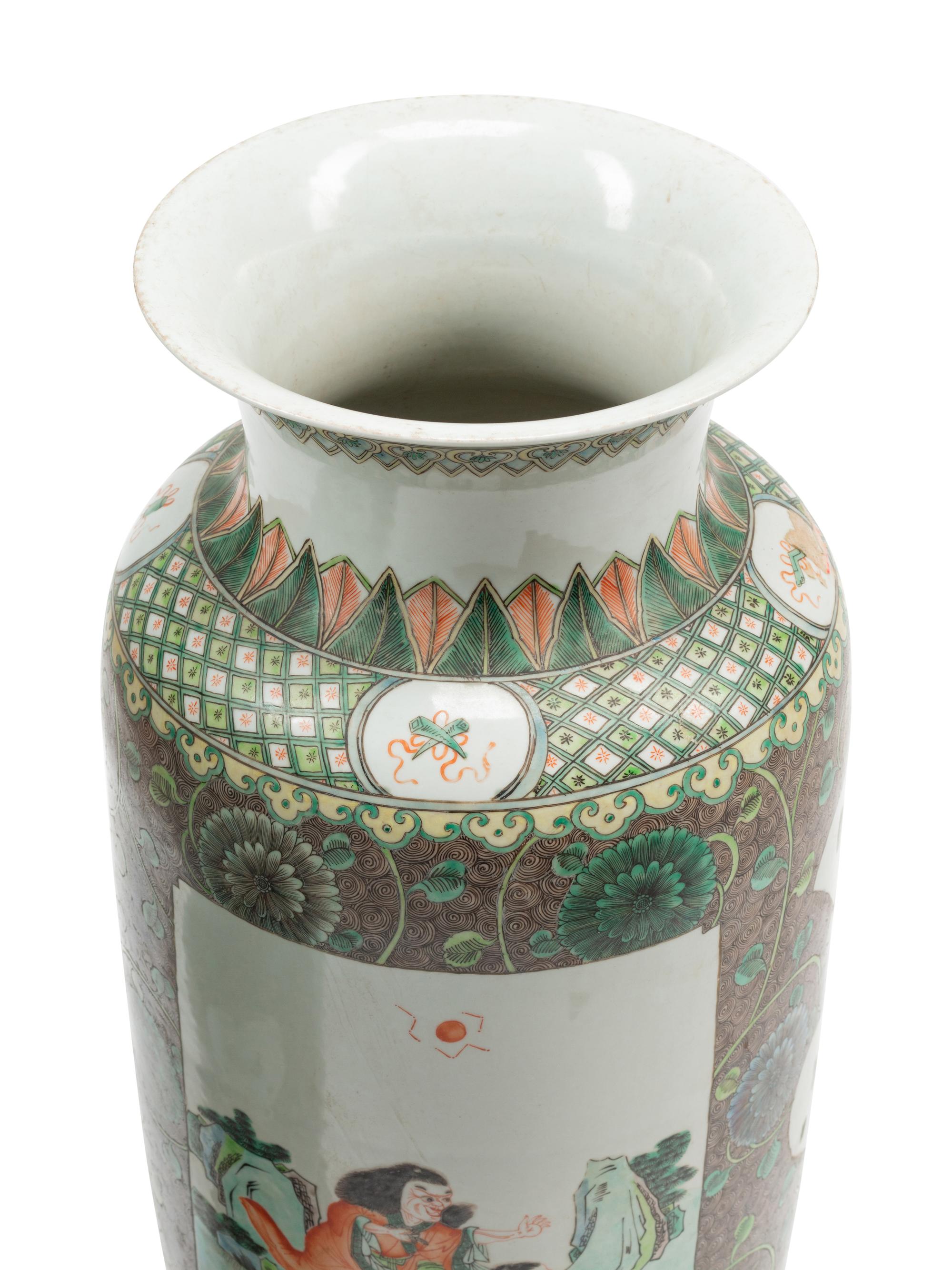 A Pair of Chinese Export Enameled Porcelain Vases on Carved Giltwood Bases