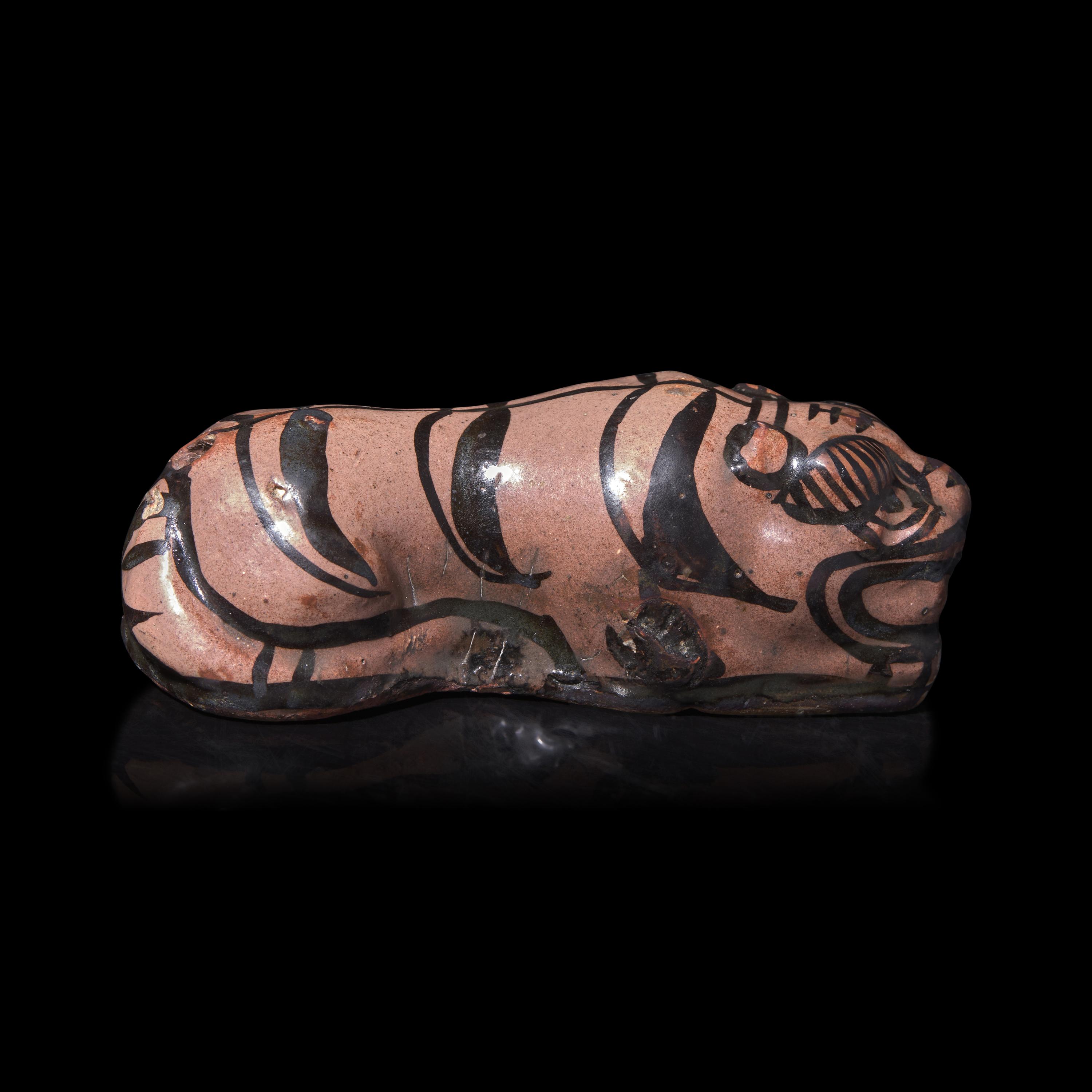 A Chinese Cizhou Glazed Figure of a Tiger 磁州窯臥虎形擺件