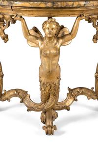 An Italian Rococo Style Giltwood and Giallo Antico Marble-Top Console Table
