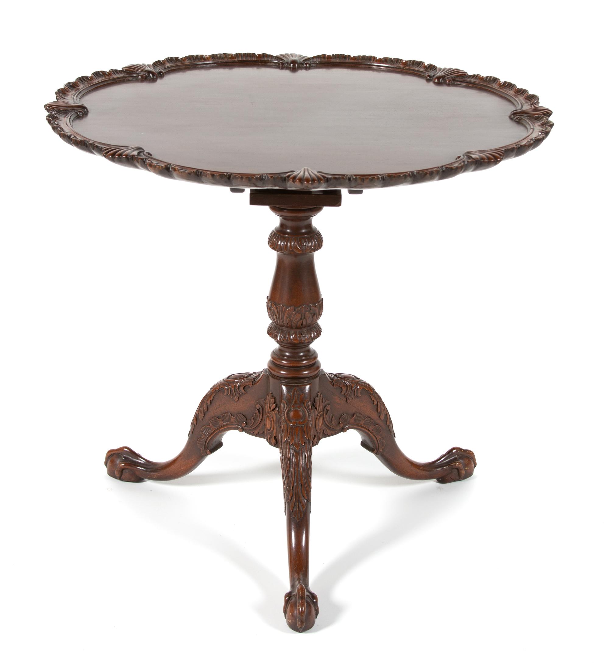 A George II Style Carved Mahogany Tilt Top Table