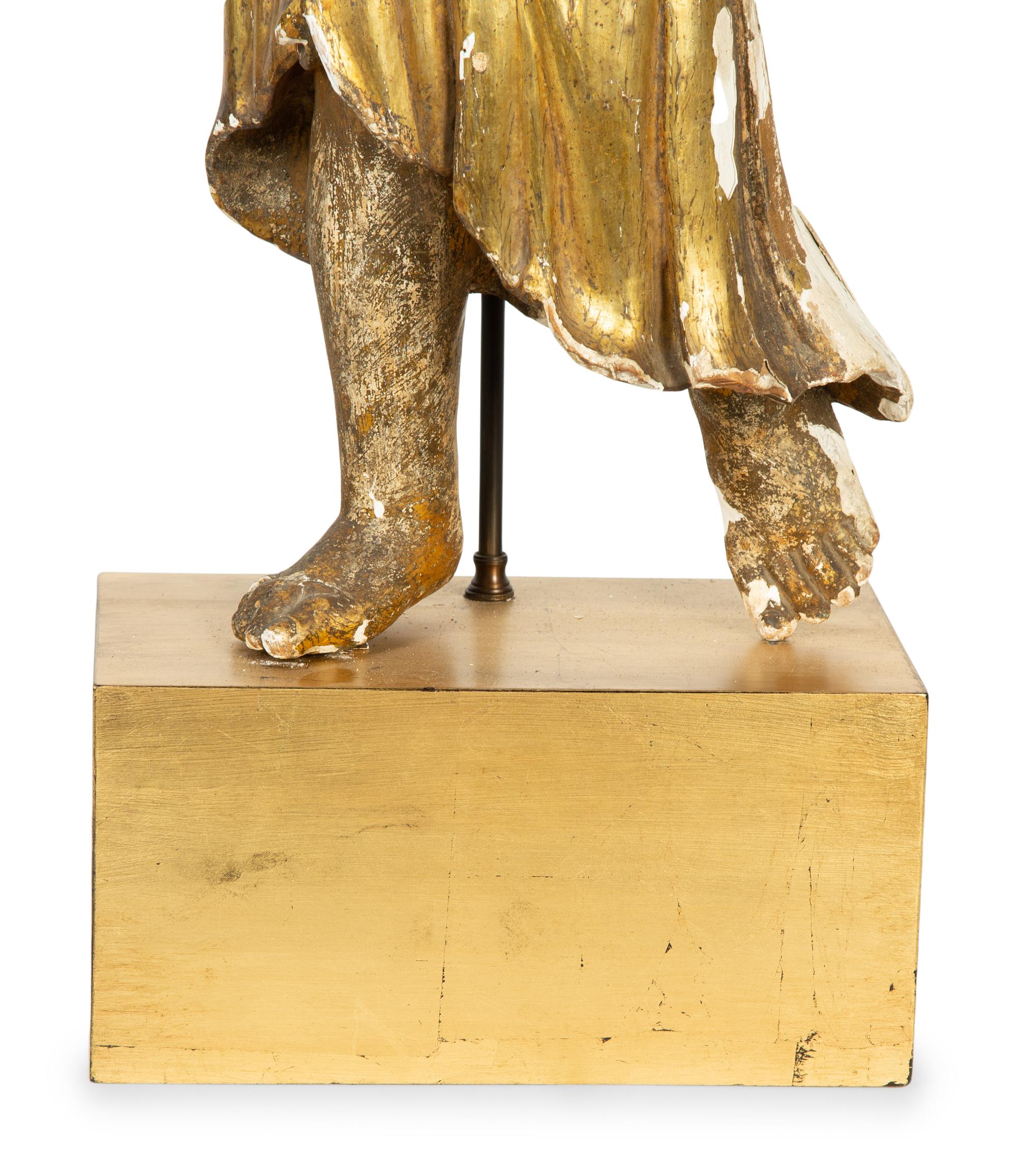 A Continental Giltwood Figure of an Angel