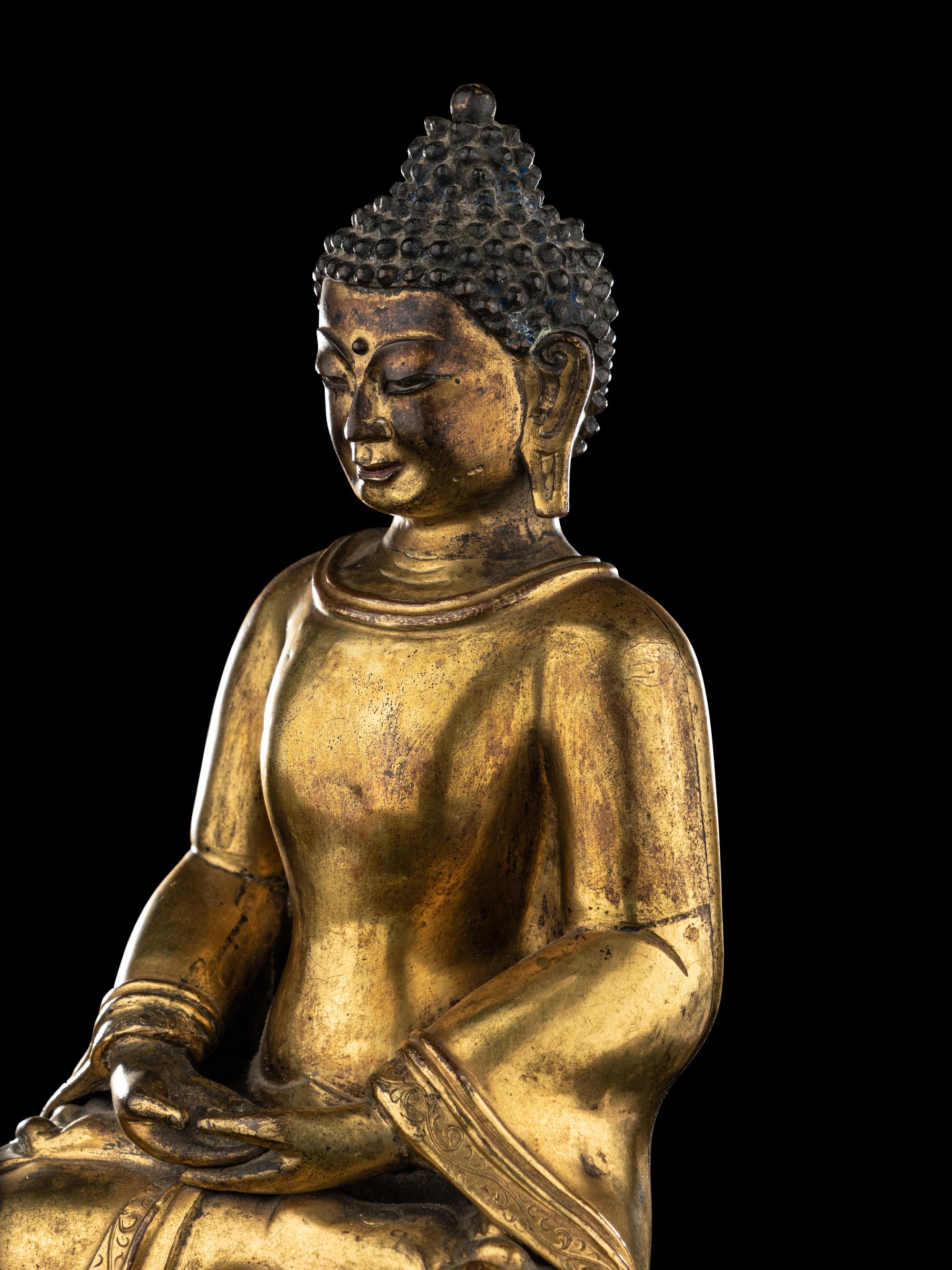 A Large Tibetan Gilt Bronze Figure of Seated Buddha