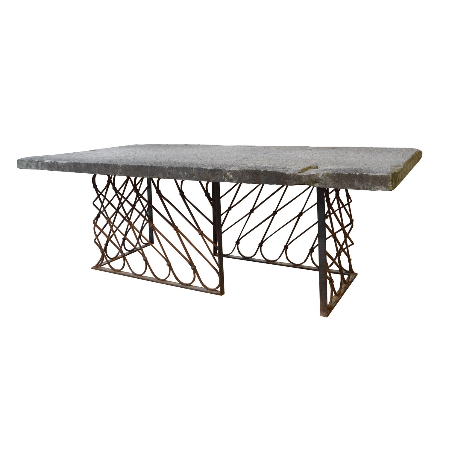 A Stone and Wrought Iron Table 98" W x 47" D x 31.5" H — Italy, 17th Century and Later