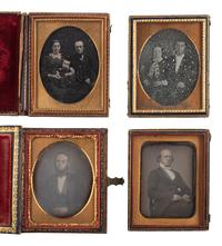 [EARLY PHOTOGRAPHY]. A group of 29 daguerreotypes featuring people with eyeglasses, including: