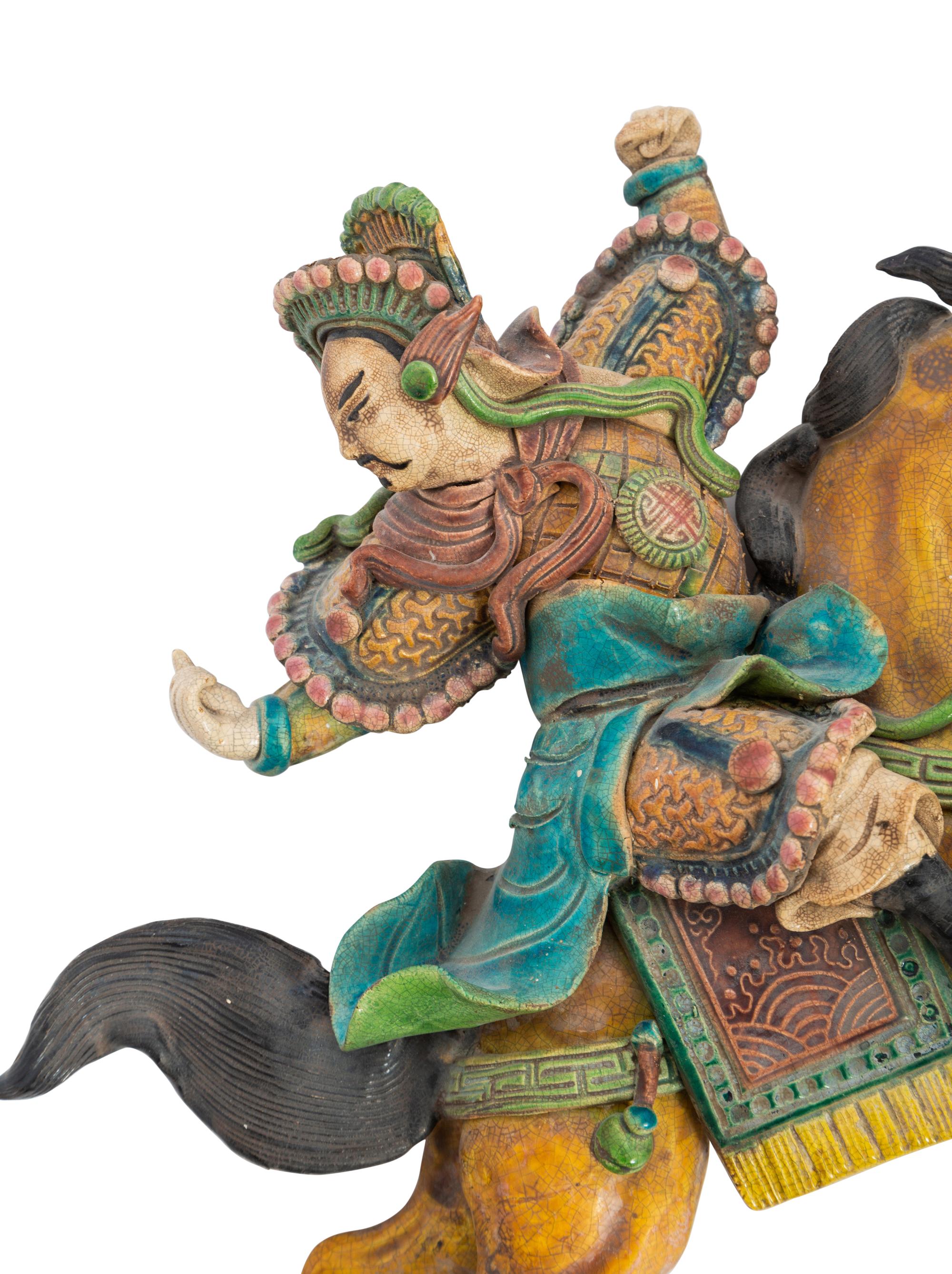 Two Chinese Painted Pottery Figural-Form Roof Tiles
