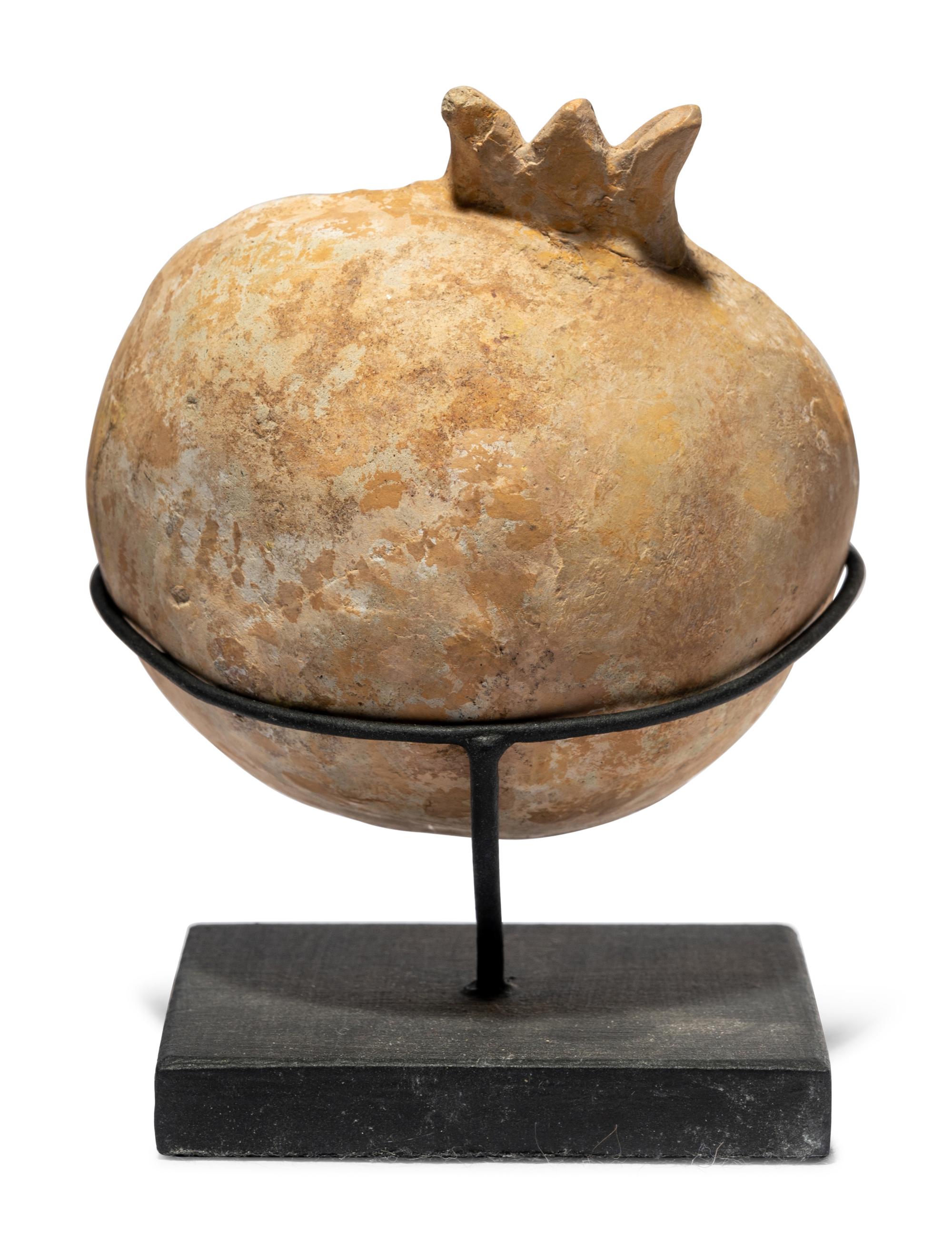A Western Greek Terracotta Pomegranate