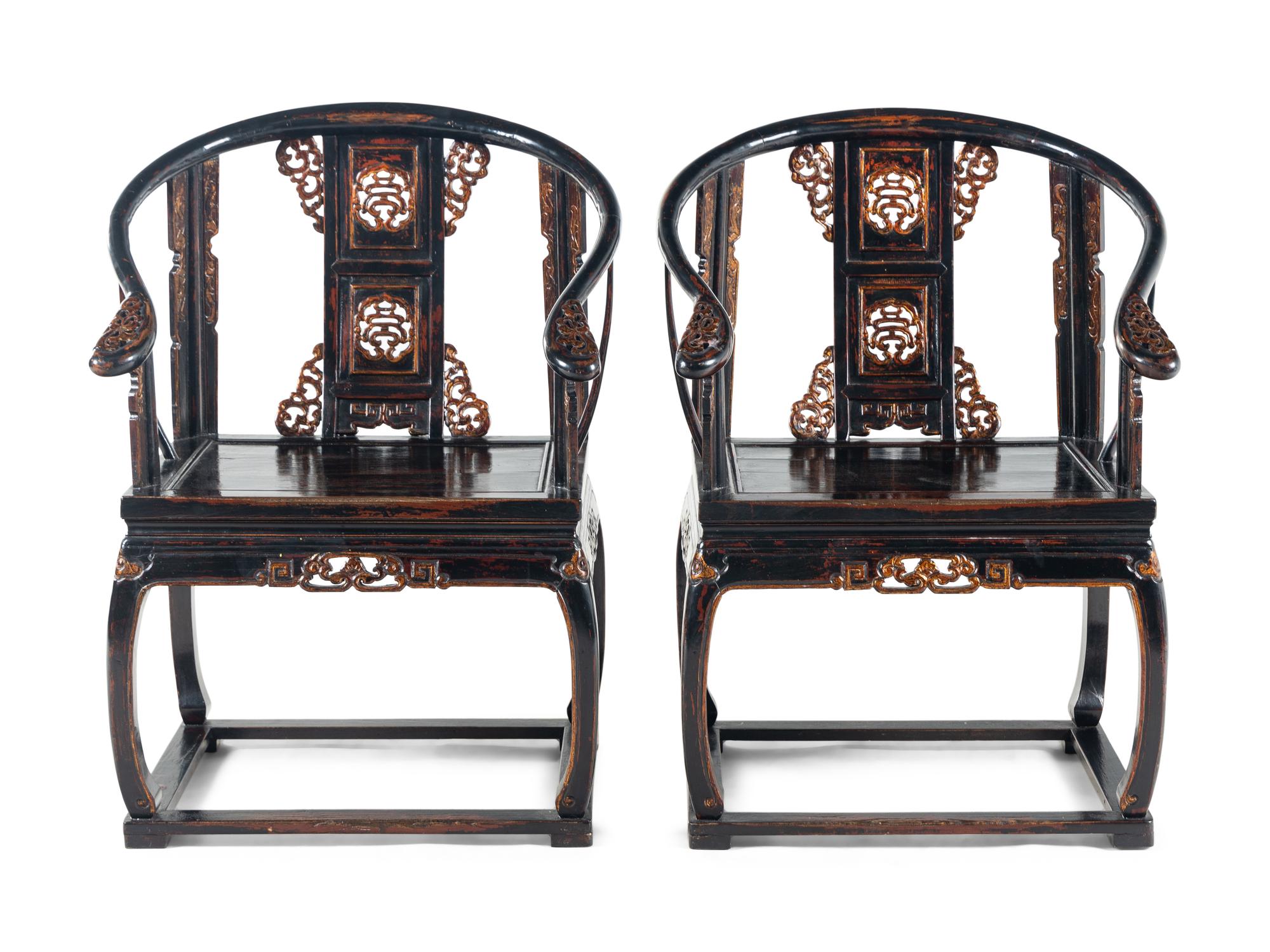 A Pair of Chinese Gilt Highlighted Black Lacquered Wood Armchairs and A Matching Rectangular Stand