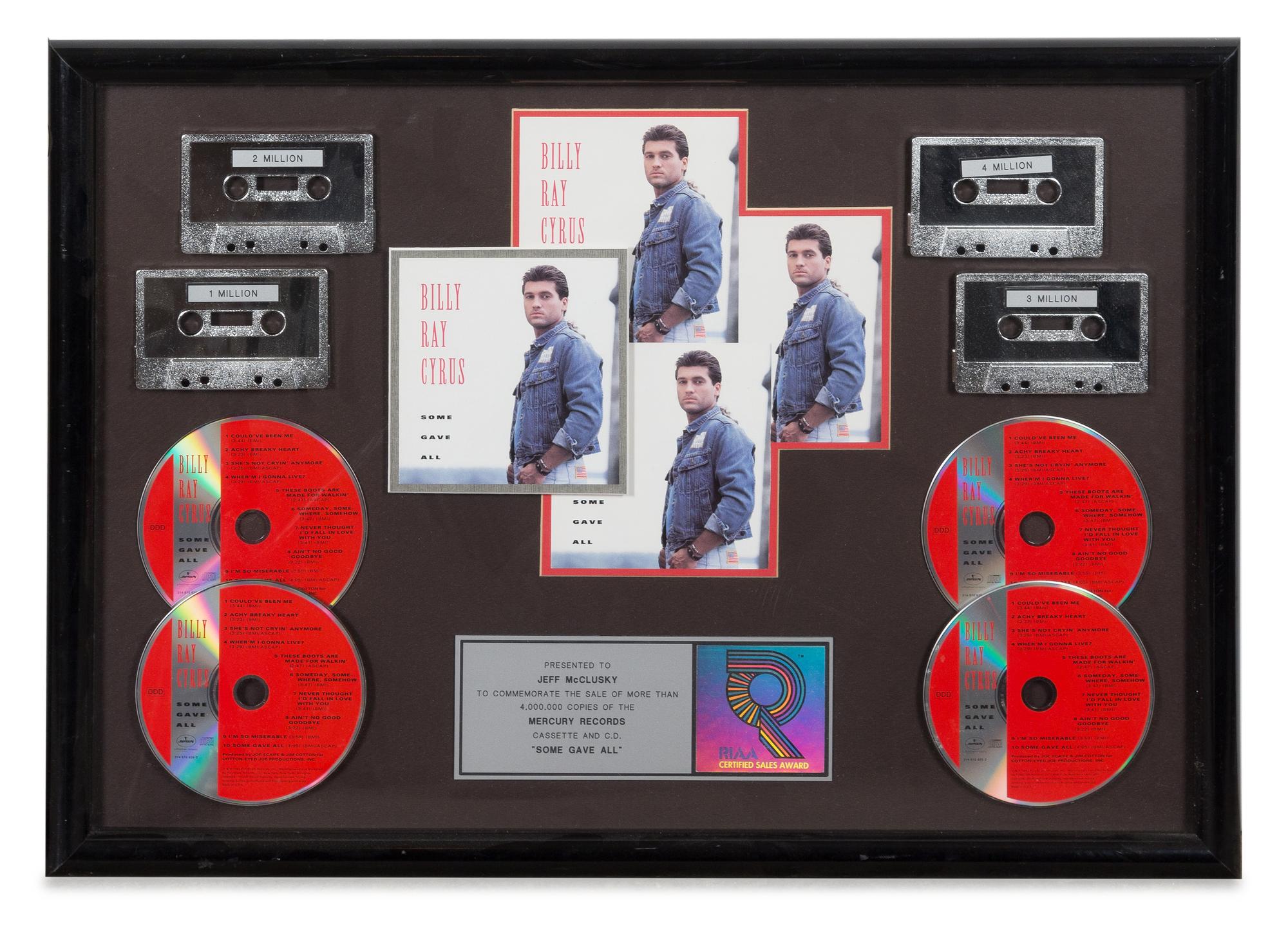 A Billy Ray Cyrus: Some Gave All RIAA Certified 4x Platinum Presentation Album 17 1/2 x 24 1/2 inches.