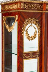 A Louis XVI Style Gilt Bronze Mounted Marble-Top Vitrine Cabinet