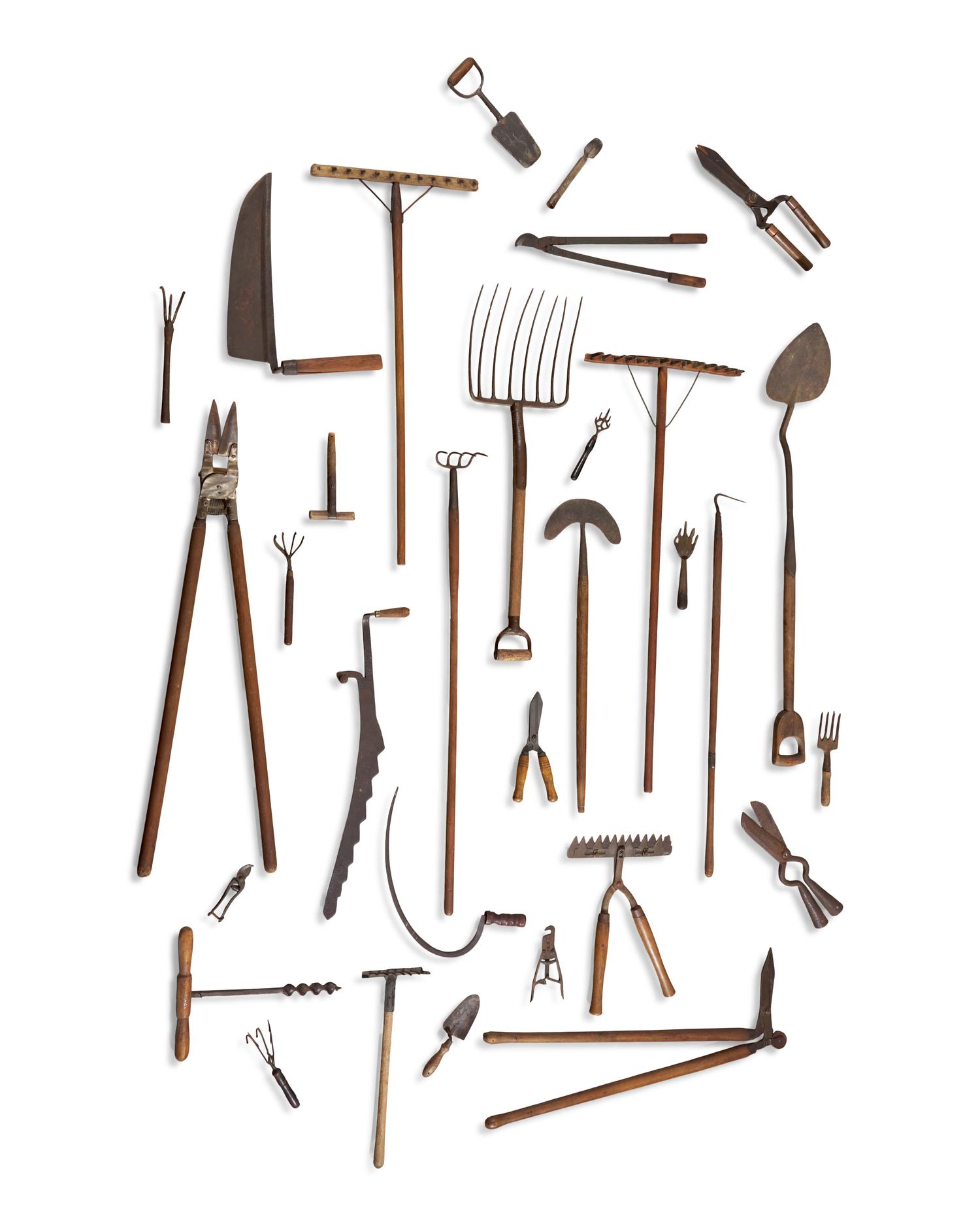 An Assorted Collection of Thirty-One Metal and Wood Garden Tools