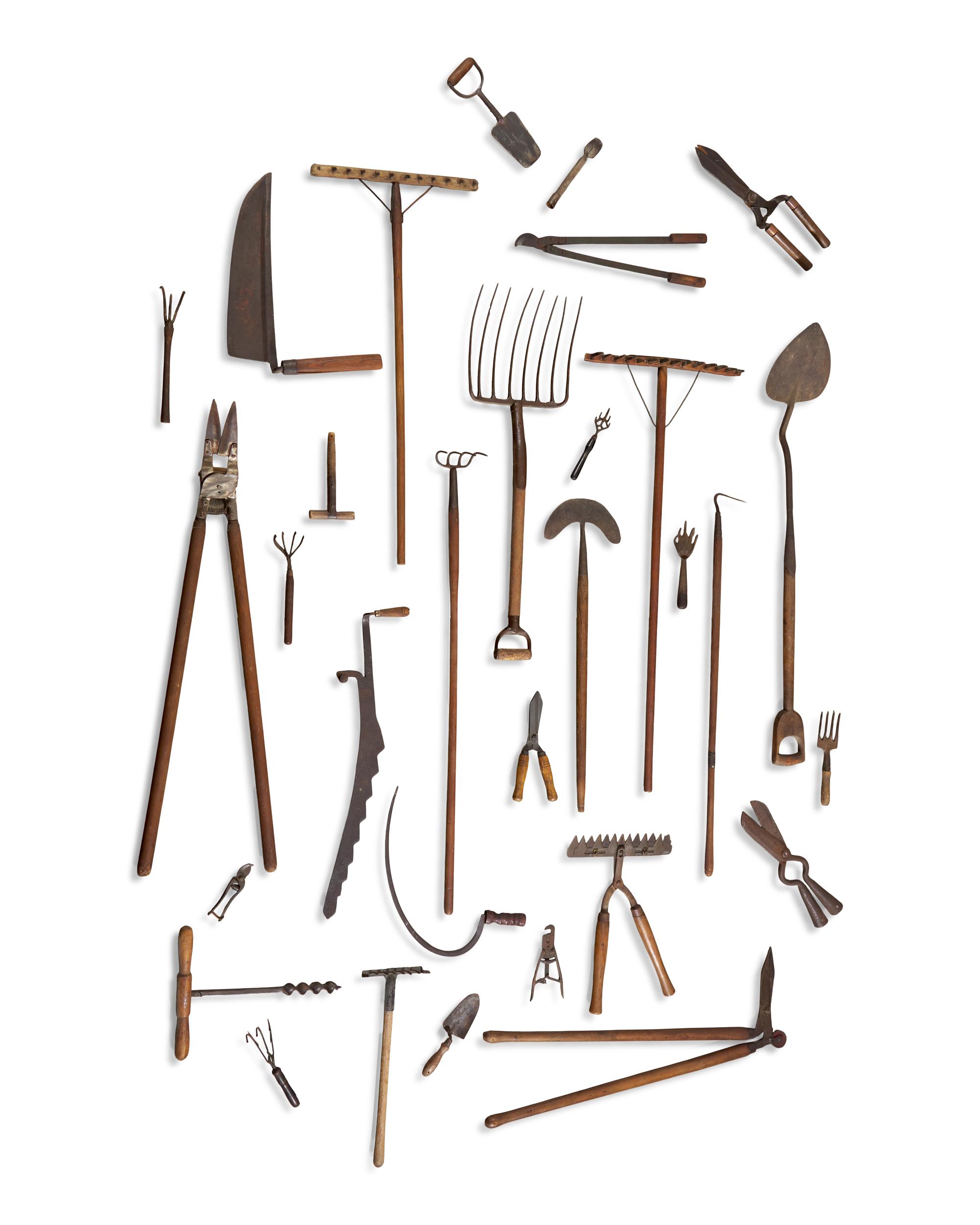 An Assorted Collection of Thirty-One Metal and Wood Garden Tools