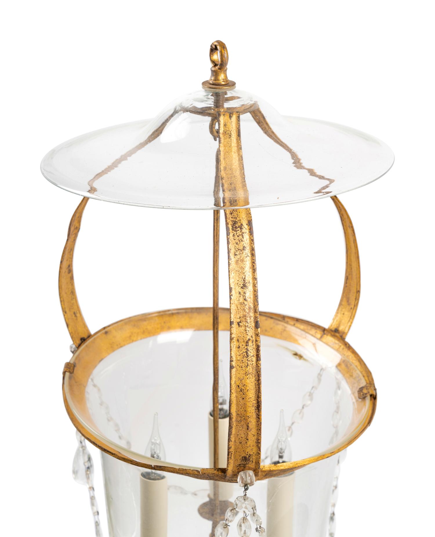 A Regency Style Gilt Metal and Glass Three-Light Lantern