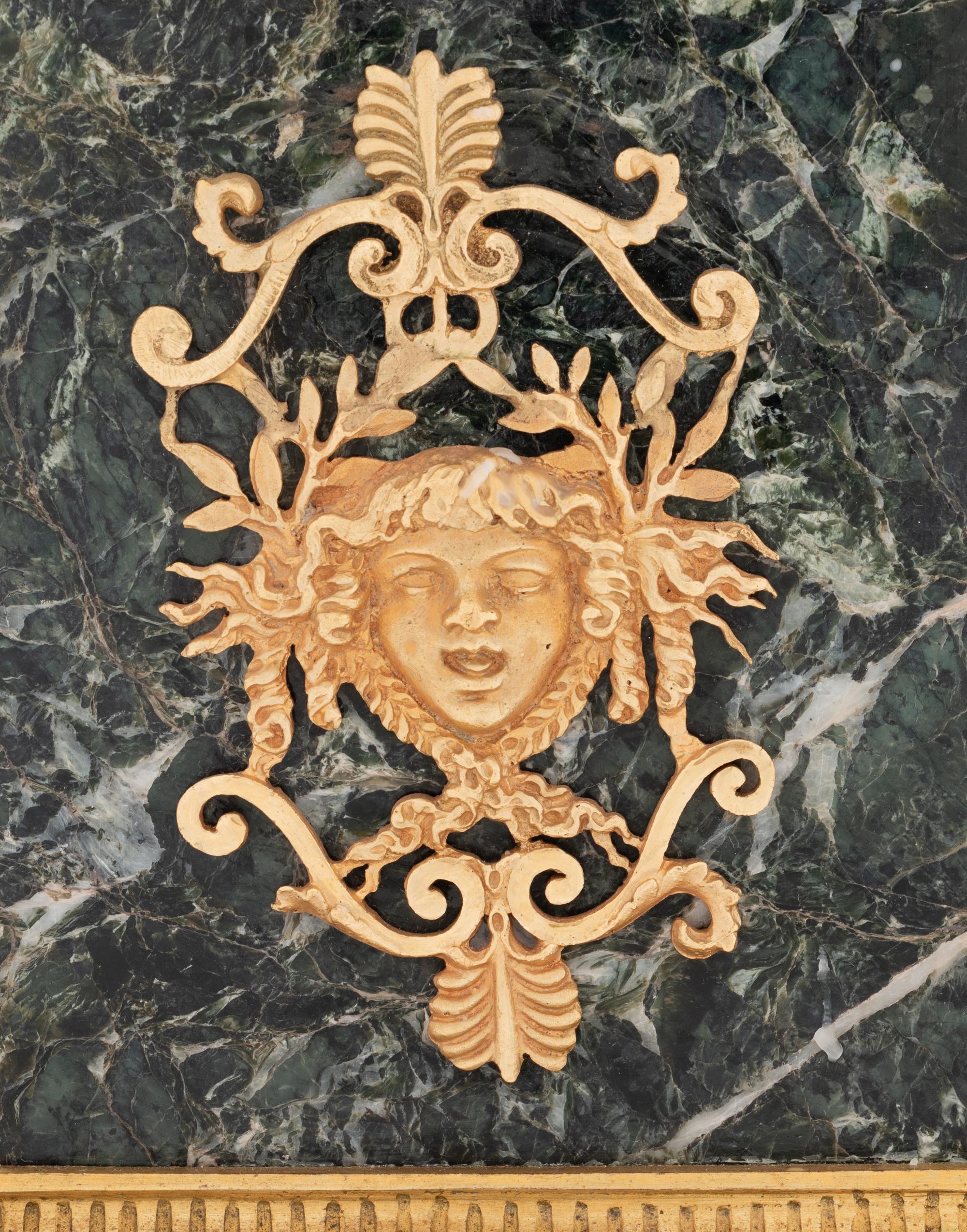 A Pair of Empire Gilt and Patinated Bronze and Marble Three-Light Figural Candelabra