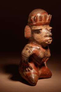 A Nicoya Polychrome Terracotta Seated Figure