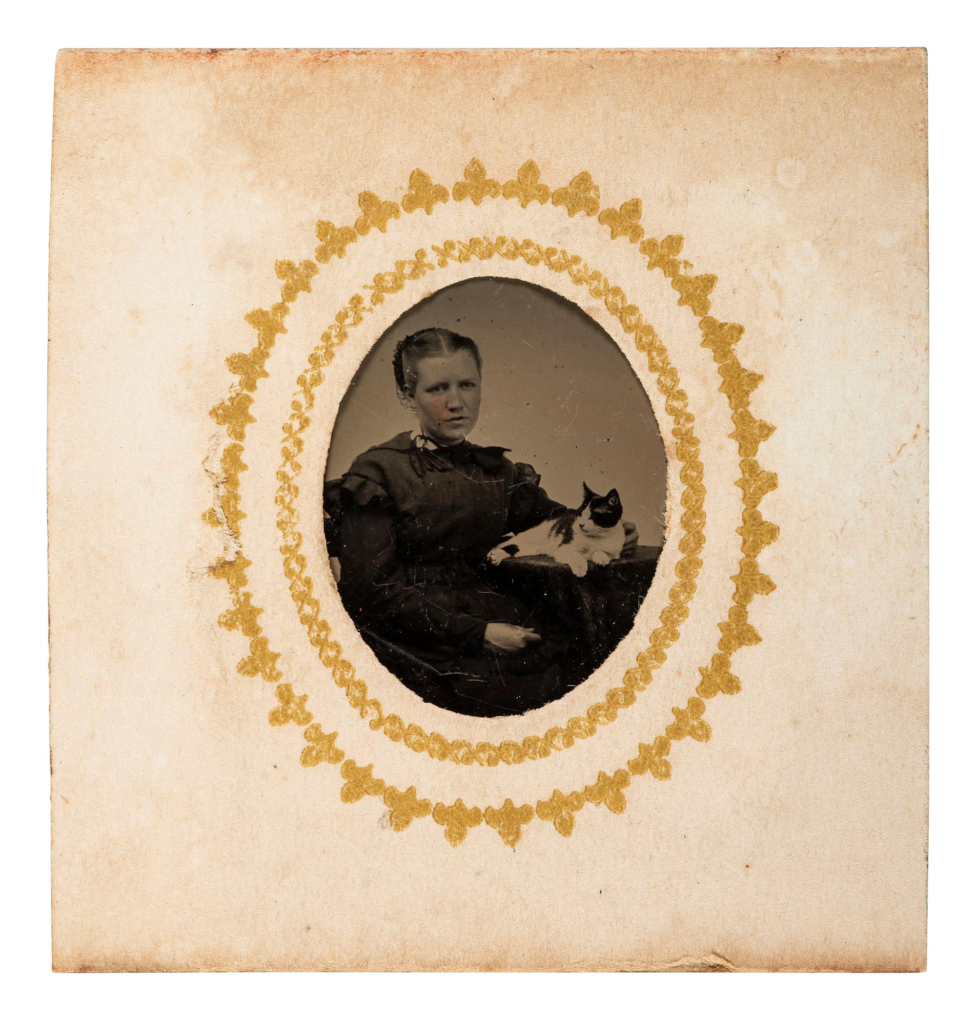 [EARLY PHOTOGRAPHY]. Tintypes of people with cats, incl. a charming portrait of 3 children and their feline friend by Hennigar of Lambertville, NJ.