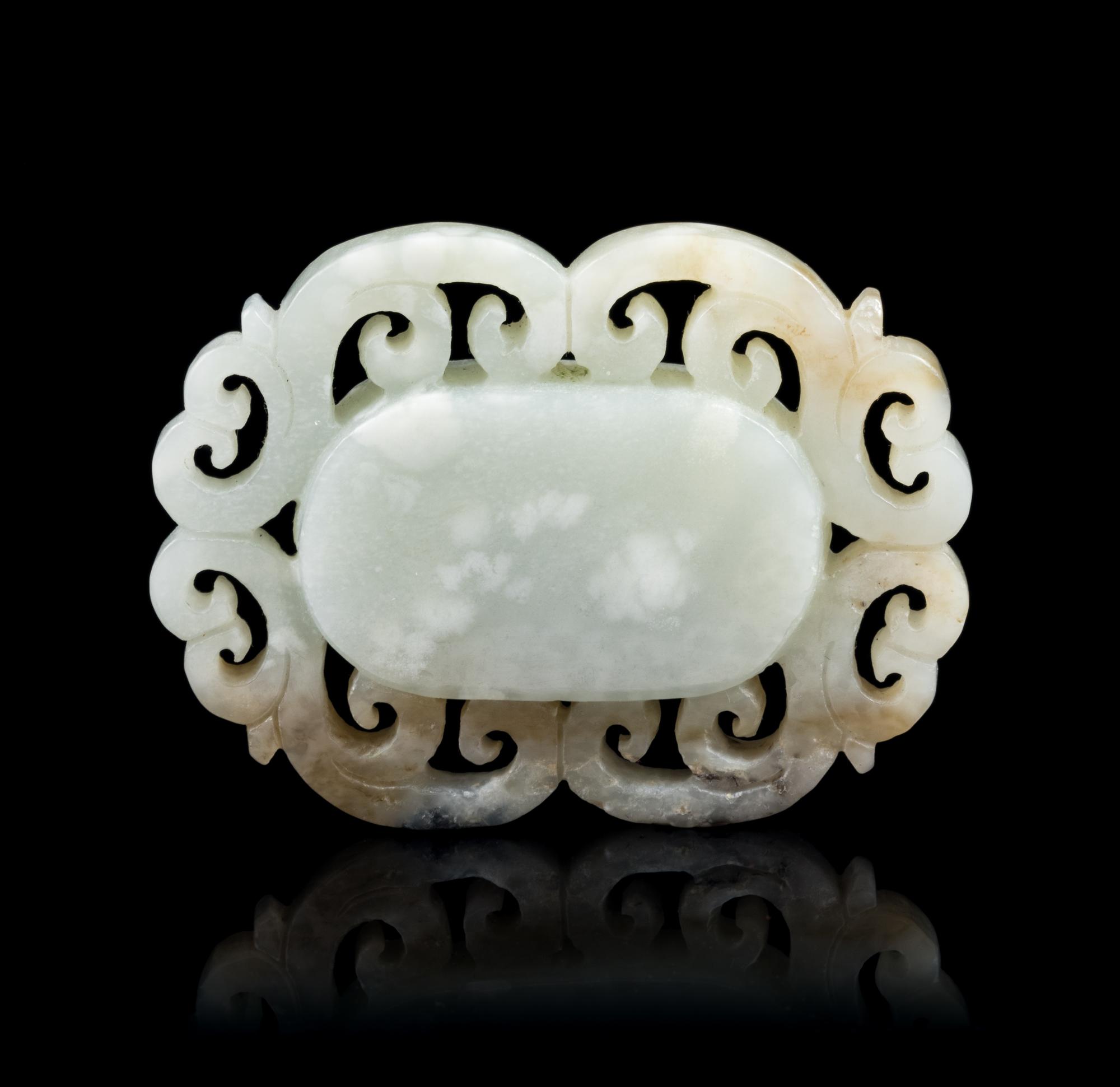 A Chinese Pale Celadon and Russet Jade Pendant