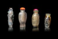 Four Chinese Carved Grey Agate Snuff Bottles