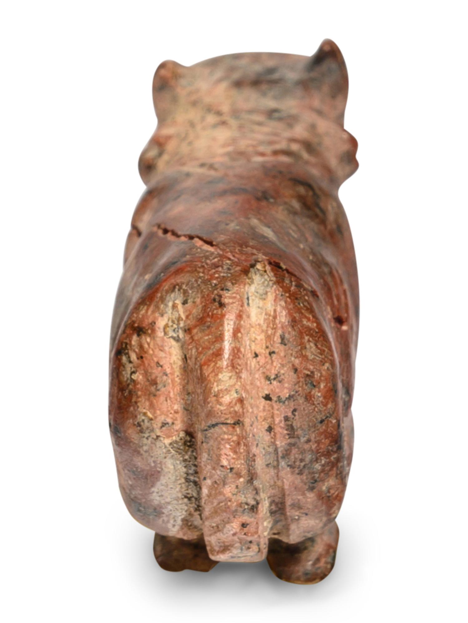 An Egyptian Red Jasper Trussed Cow