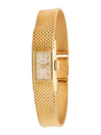 GÜBELIN, 18K YELLOW GOLD WATCH