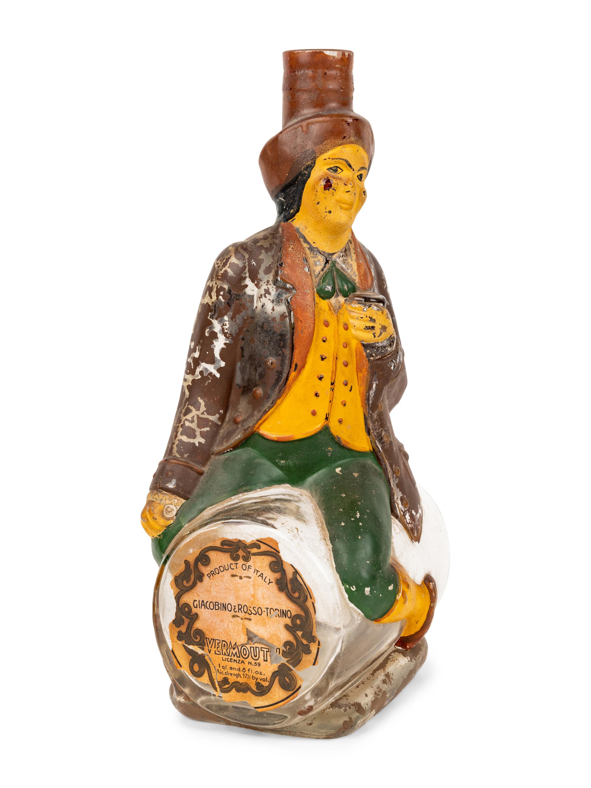 An Italian Giacobino & Rosso-Torino Figural Glass Vermouth Bottle and a Toby Jug