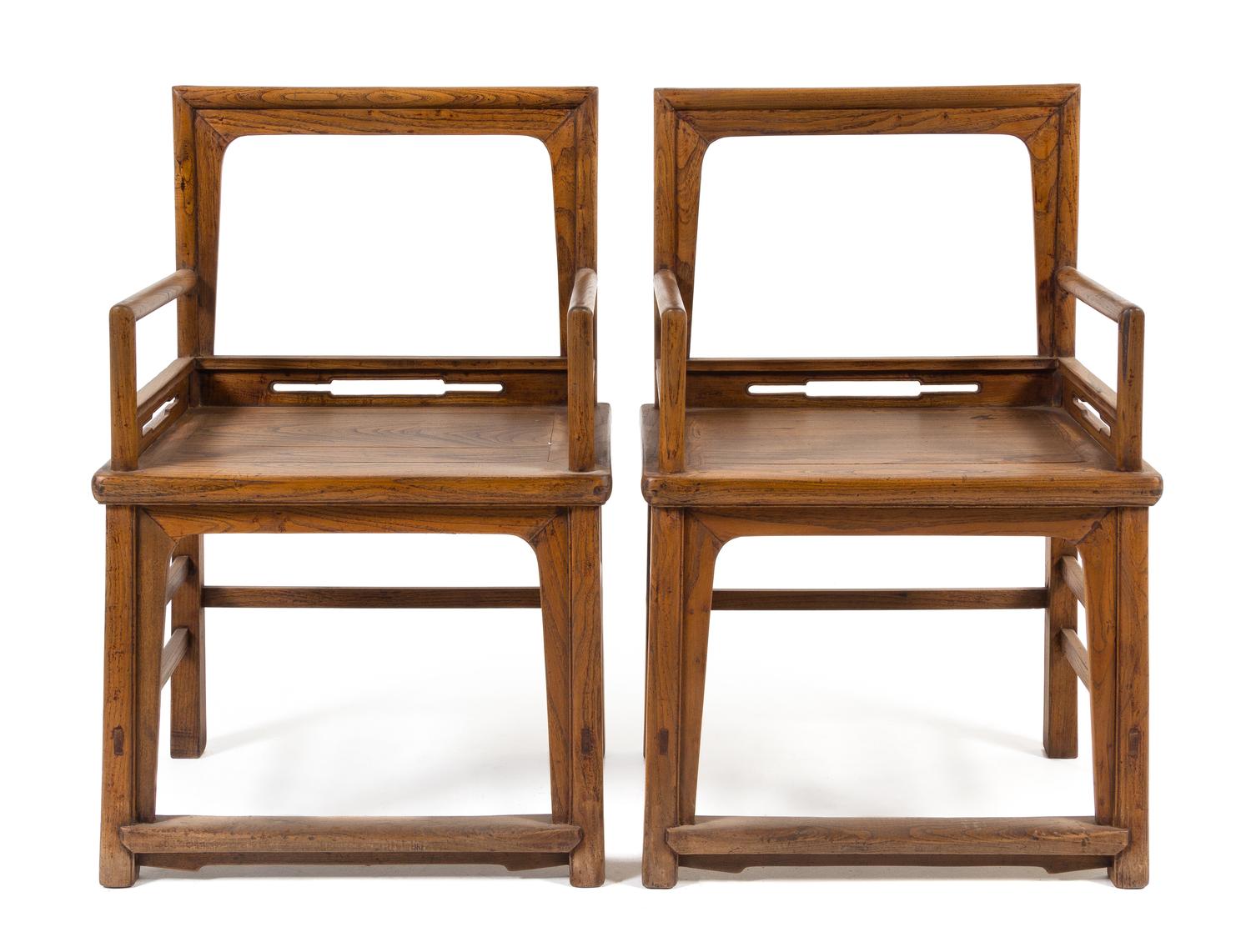A Pair of Chinese Elmwood Armchairs, Meiguiyi Height 38 1/2 x width 25 x depth 18 1/8 inches. — QING DYNASTY (1644-1911)