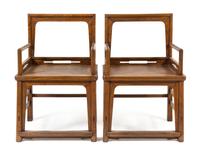 A Pair of Chinese Elmwood Armchairs, Meiguiyi Height 38 1/2 x width 25 x depth 18 1/8 inches. — QING DYNASTY (1644-1911)