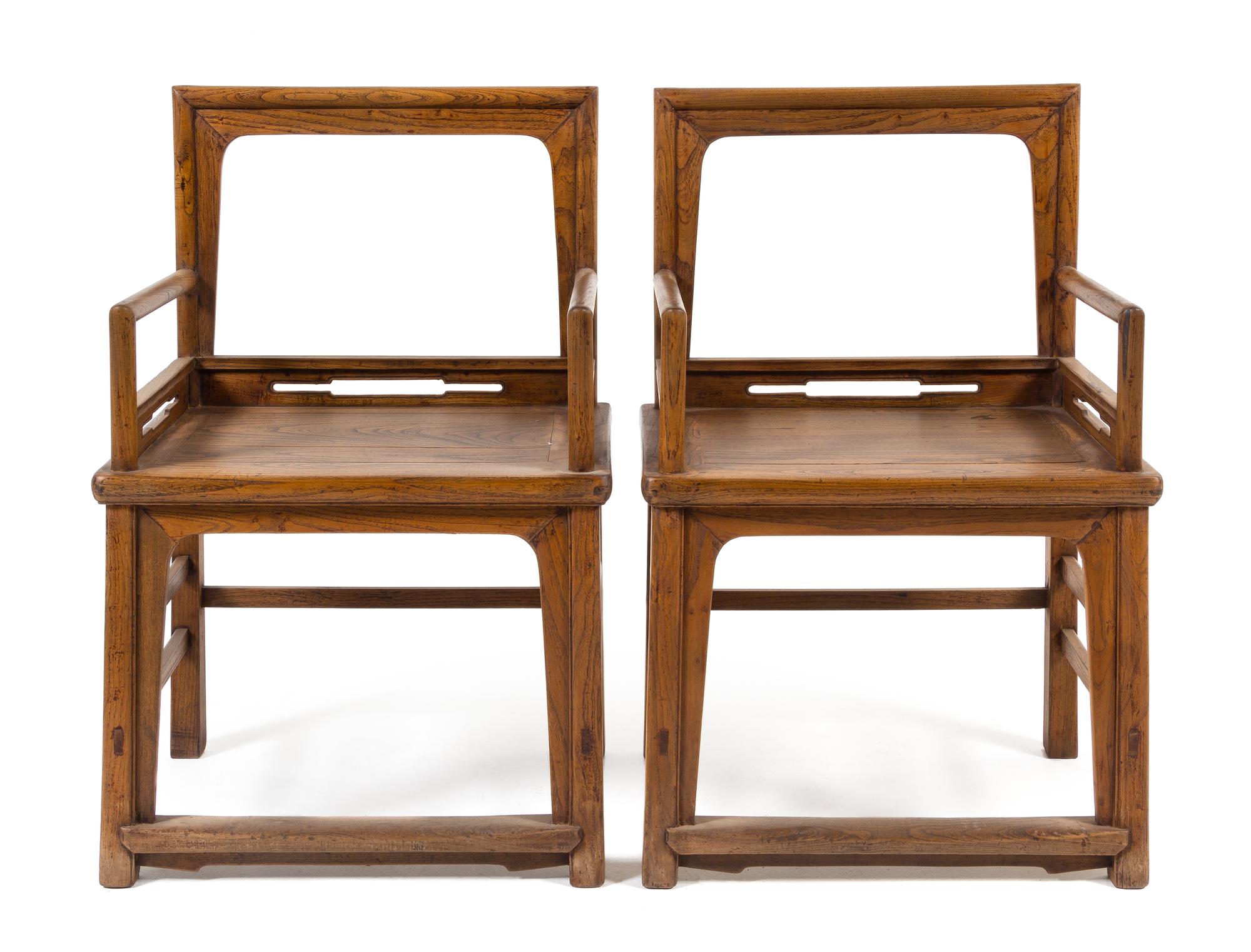 A Pair of Chinese Elmwood Armchairs, Meiguiyi Height 38 1/2 x width 25 x depth 18 1/8 inches. — QING DYNASTY (1644-1911)